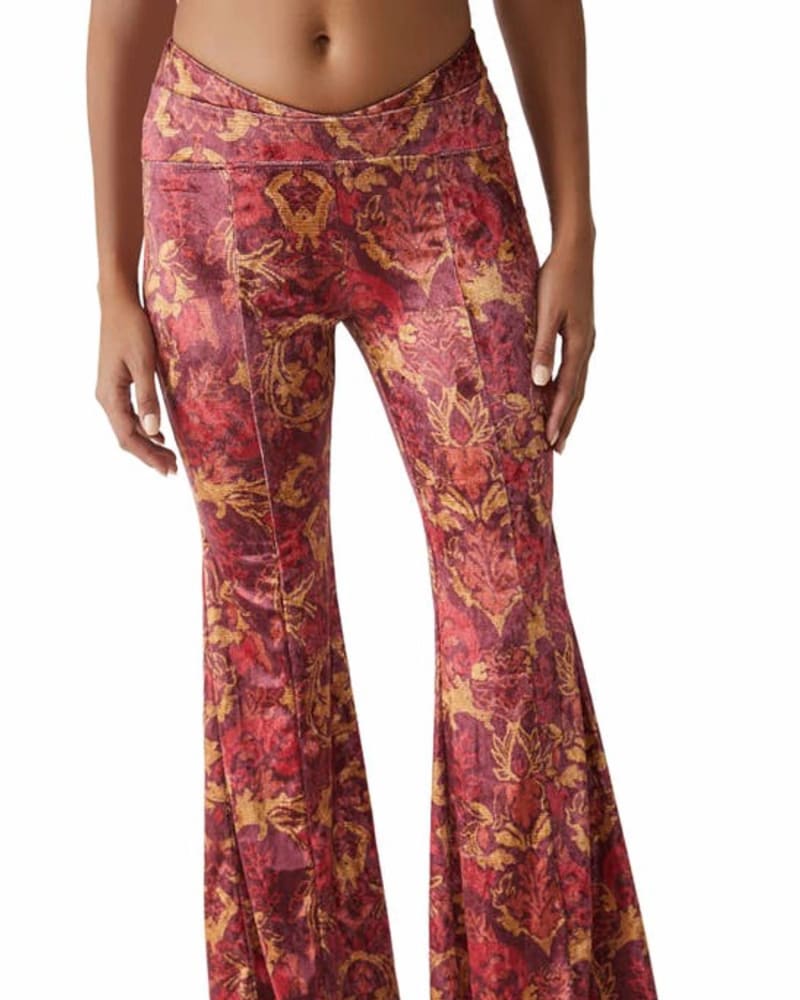 Front of a model wearing a size L Hold Me Closer Bell Bottom Pants In Flame Combo in Flame Combo by Free People. | dia_product_style_image_id:360236